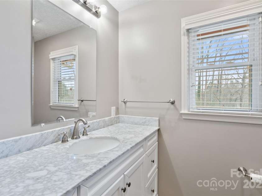 25 Pisgah Shadows Way, Hendersonville, NC 28739.  MLS# CAR4206550, YatesRealty ID 9897. Hall bathroom