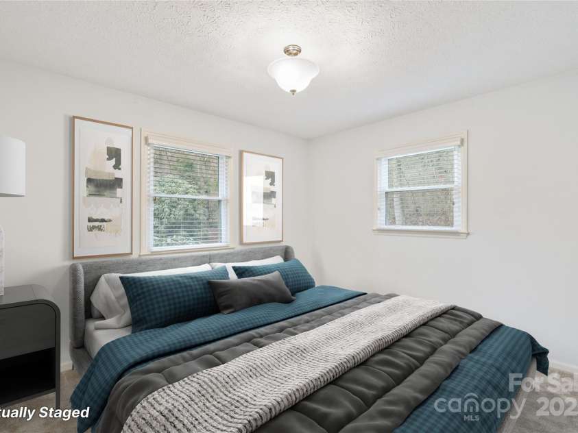 25 Pisgah Shadows Way, Hendersonville, NC 28739.  MLS# CAR4206550, YatesRealty ID 9897. Virtually Staged - Bedroom 2. This image has been virtually staged. Furniture placement is for visual inspiration and may not reflect actual dimensions or scale.