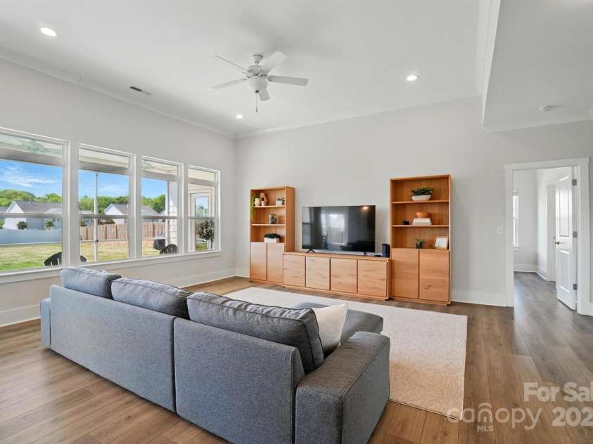 1116 Brooksland Place, Waxhaw, NC 28173.  MLS# CAR4249949, YatesRealty ID 9900. Crown molding and recessed light details in this heightened Family Room ceiling.