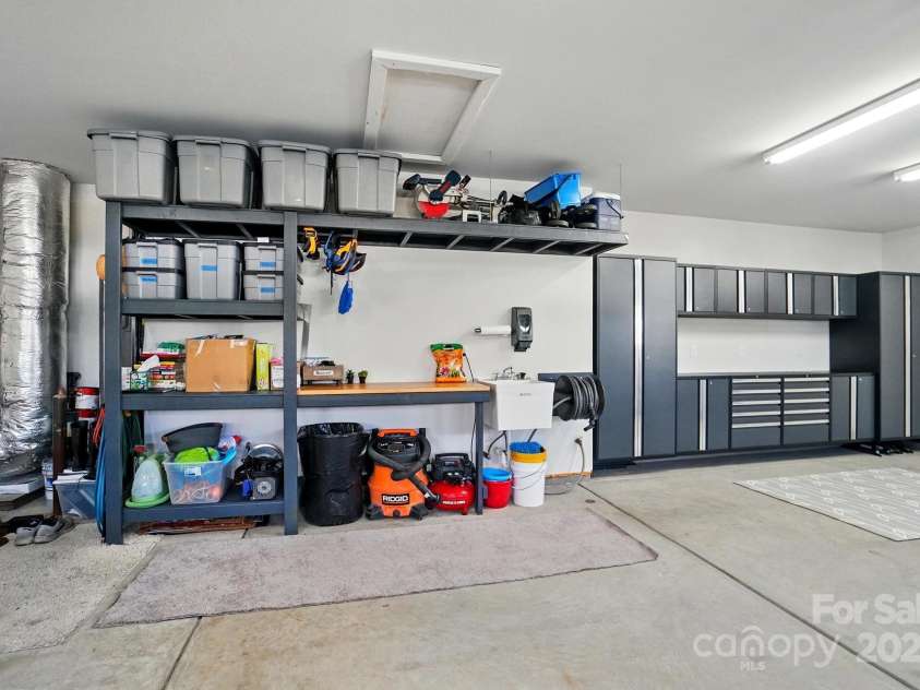 1116 Brooksland Place, Waxhaw, NC 28173.  MLS# CAR4249949, YatesRealty ID 9900. Extra deep garage has space to park and storage too.