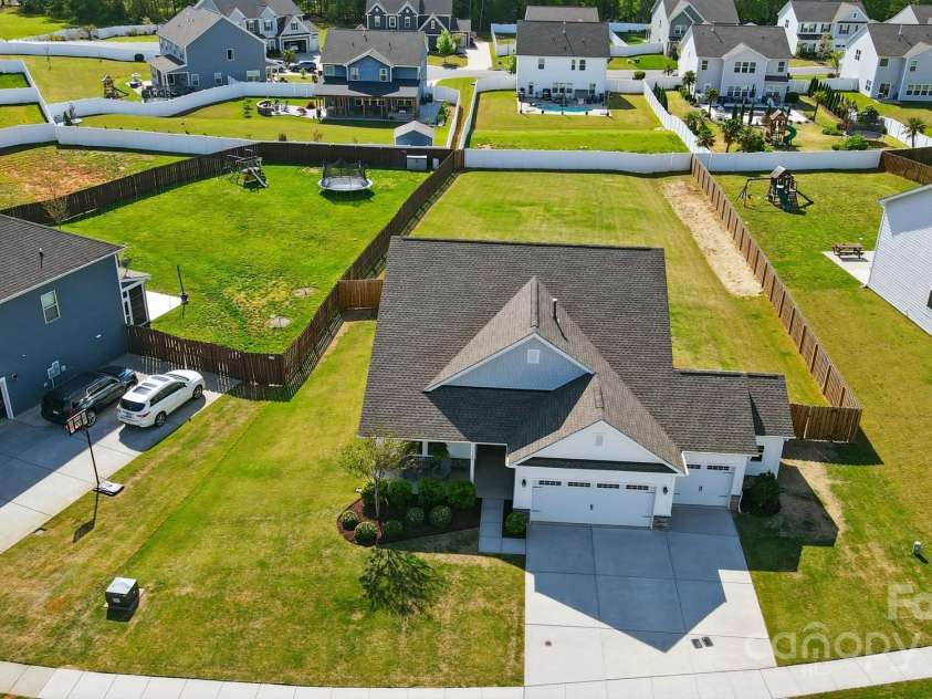 1116 Brooksland Place, Waxhaw, NC 28173.  MLS# CAR4249949, YatesRealty ID 9900. Flat backyard ready for gardening or playing!