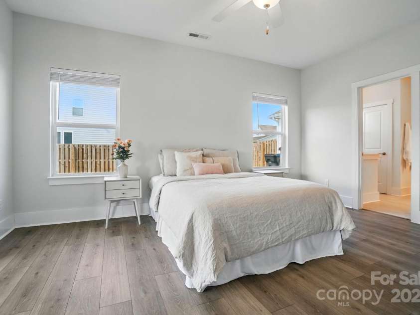 1116 Brooksland Place, Waxhaw, NC 28173.  MLS# CAR4249949, YatesRealty ID 9900. Primary Bedroom has same laminate floor as main home.