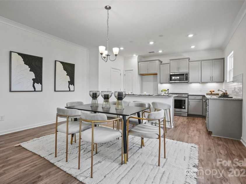 5924 Chumbley Point Road, Charlotte, NC 28215.  MLS# CAR4309423, YatesRealty ID 9908. Kitchen/dining is representative