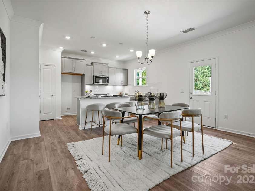 5924 Chumbley Point Road, Charlotte, NC 28215.  MLS# CAR4309423, YatesRealty ID 9908. Kitchen/dining is representative