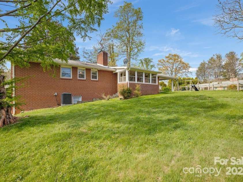 211 Monroe Drive, Hendersonville, NC 28792.  MLS# CAR4254038, YatesRealty ID 9911. Backyard