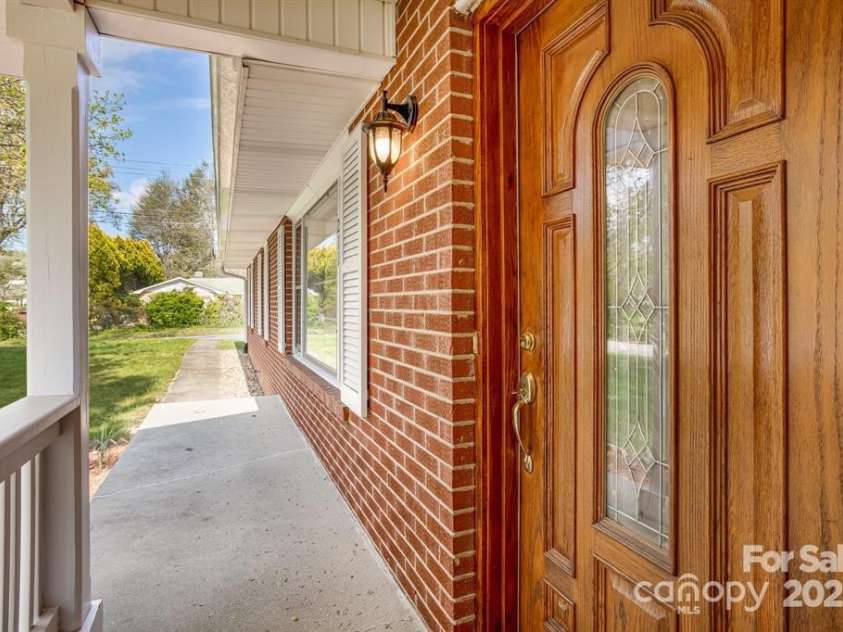 211 Monroe Drive, Hendersonville, NC 28792.  MLS# CAR4254038, YatesRealty ID 9911. Front Porch
