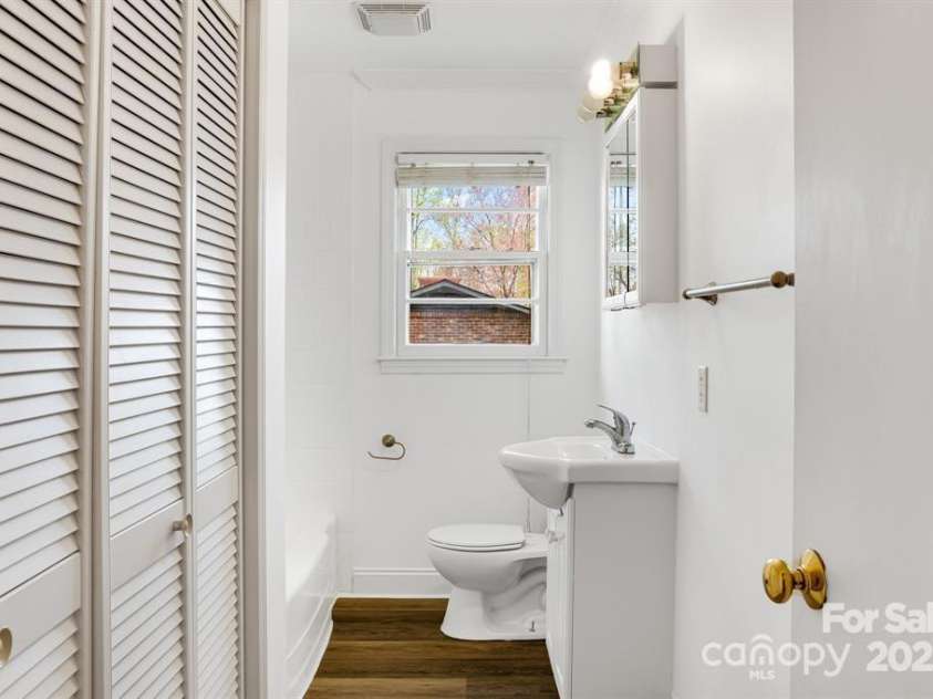 211 Monroe Drive, Hendersonville, NC 28792.  MLS# CAR4254038, YatesRealty ID 9911. Laundry/Bathroom