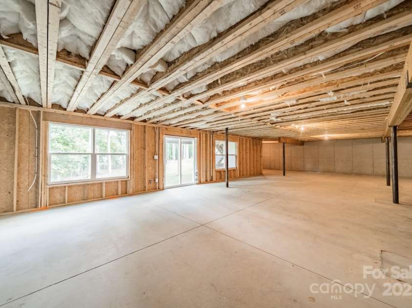 6034 Jepson Court, Charlotte, NC 28214.  MLS# CAR4292167, YatesRealty ID 9915. Unfinished basement