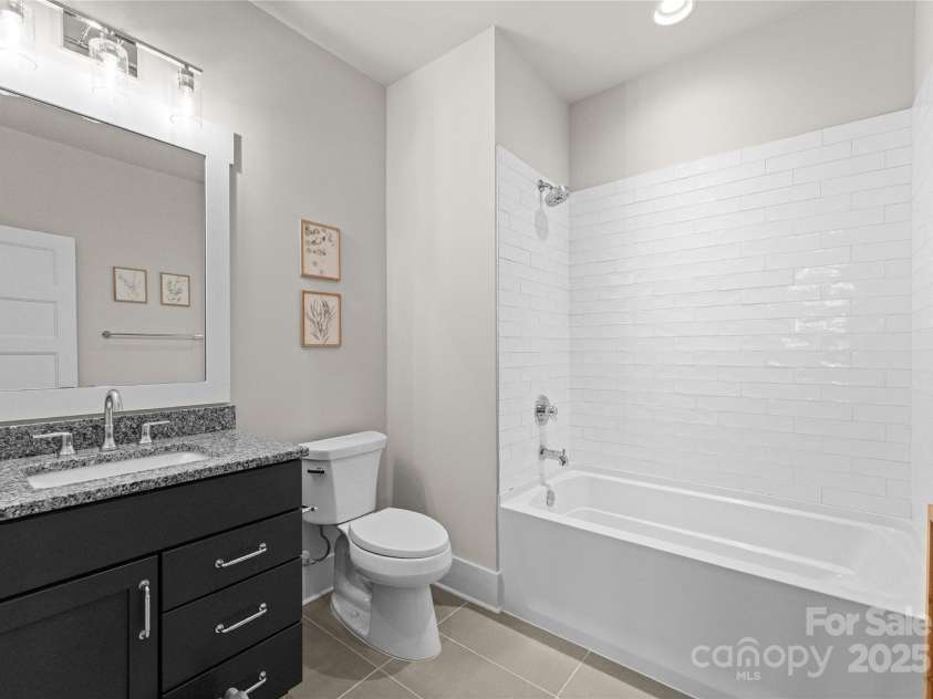 831 Naples Drive, Davidson, NC 28036.  MLS# CAR4220405, YatesRealty ID 9916. Guest bath