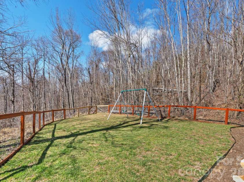 588 Long Branch Road, Swannanoa, NC 28778.  MLS# CAR4364788, YatesRealty ID 9917. Fully fenced yard