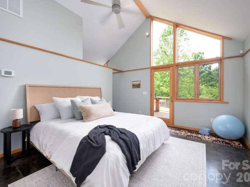 588 Long Branch Road, Swannanoa, NC 28778.  MLS# CAR4364788, YatesRealty ID 9917. Main level primary suite with vaulted ceilings