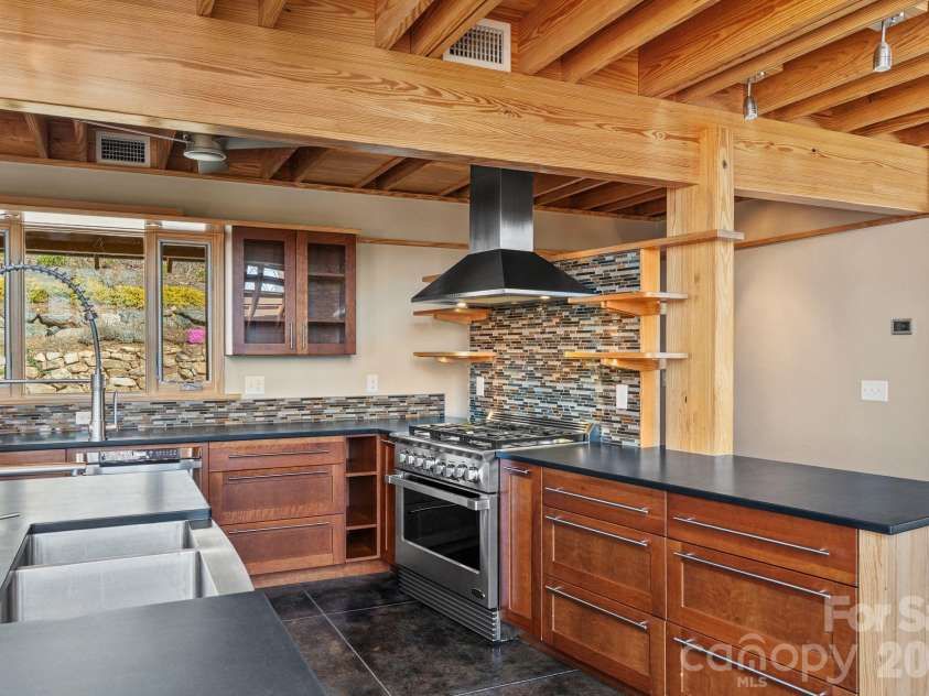 588 Long Branch Road, Swannanoa, NC 28778.  MLS# CAR4364788, YatesRealty ID 9917. Sleek design throughout this beautiful space