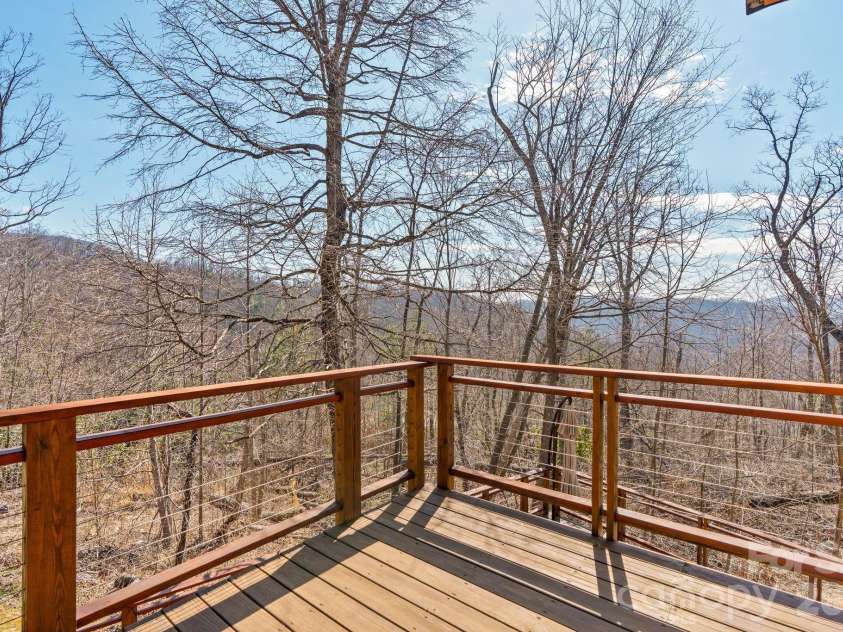 588 Long Branch Road, Swannanoa, NC 28778.  MLS# CAR4364788, YatesRealty ID 9917. Winter views off the large deck (could be opened up with additional tree trimming)