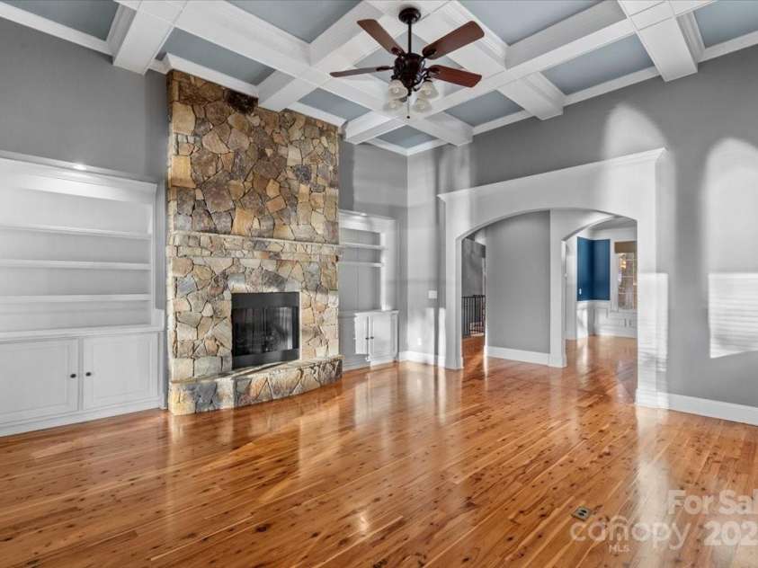 3853 Gordon Street, Terrell, NC 28682.  MLS# CAR4201015, YatesRealty ID 9925. A coffered ceiling soars above the primary living room
