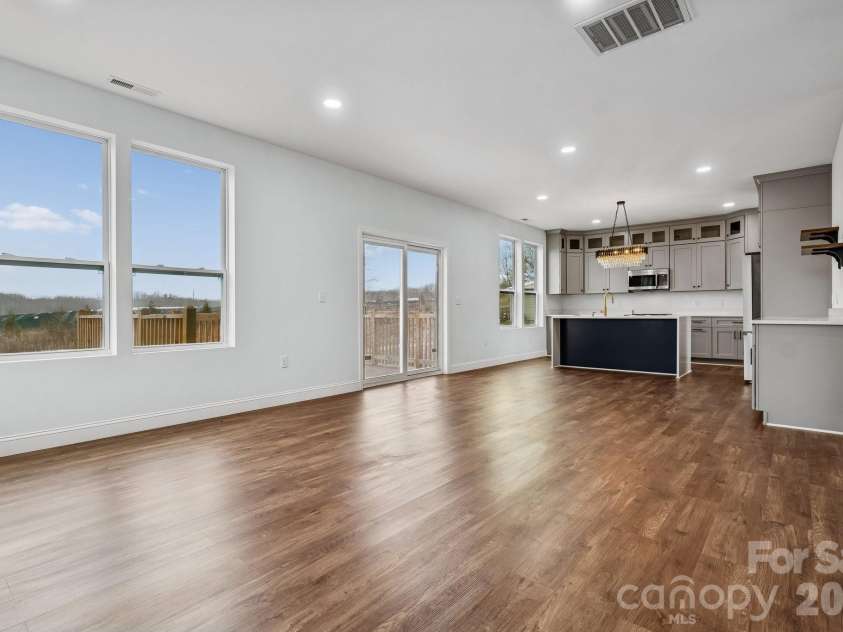 114 Strawberry Court, Lincolnton, NC 28092.  MLS# CAR4352512, YatesRealty ID 9926. Main living room offers open concept, recessed lighting, abundance of natural light and access to the rear deck