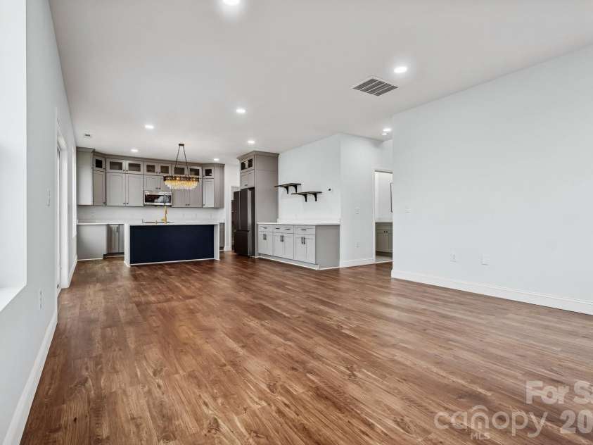 114 Strawberry Court, Lincolnton, NC 28092.  MLS# CAR4352512, YatesRealty ID 9926. Main living room offers open concept, recessed lighting, abundance of natural light and access to the rear deck