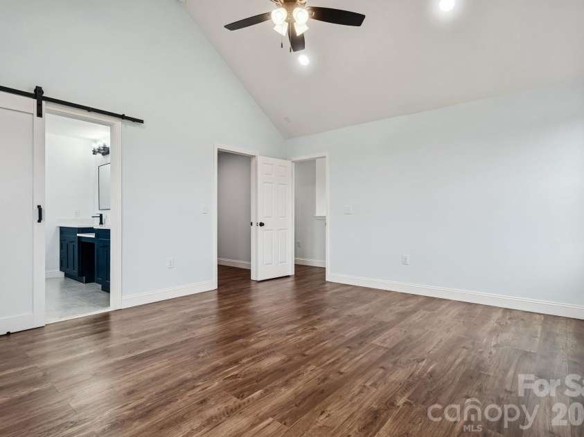 114 Strawberry Court, Lincolnton, NC 28092.  MLS# CAR4352512, YatesRealty ID 9926. Primary bedroom on second level with cathedral ceiling, ceiling fan and recessed lighting