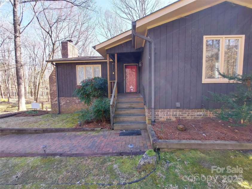 8015 Sullivan Drive, Charlotte, NC 28215.  MLS# CAR4223466, YatesRealty ID 9926. Great private entrance to ultra private peaceful cottage.
