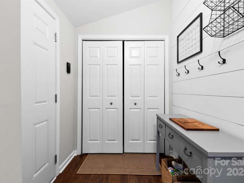 619 Archibald Road, Concord, NC 28025.  MLS# CAR4251795, YatesRealty ID 9927. Drop off zone and laundry closet neat the garage entry