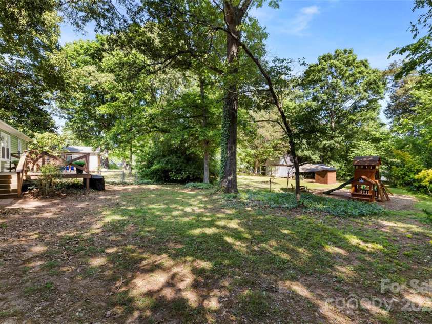 619 Archibald Road, Concord, NC 28025.  MLS# CAR4251795, YatesRealty ID 9927. Fully fenced in back yard