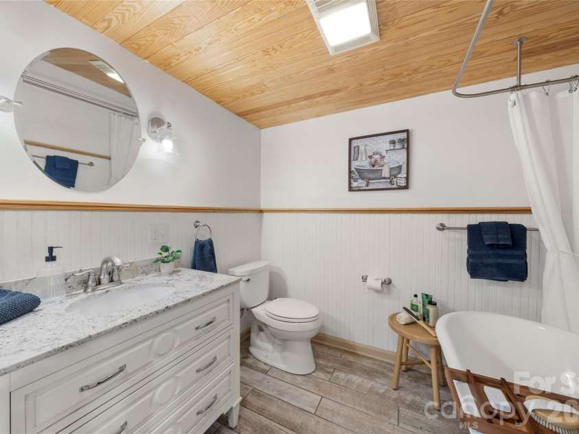 37 Cherokee Trail, Fletcher, NC 28732.  MLS# CAR4357676, YatesRealty ID 9928. Basement full bath with granite vanity
