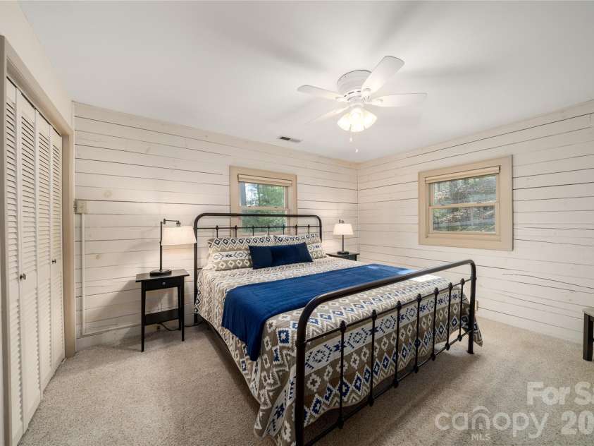 37 Cherokee Trail, Fletcher, NC 28732.  MLS# CAR4357676, YatesRealty ID 9928. Primary bedroom 1 with king bed on main 