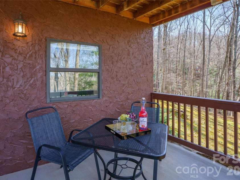37 Cherokee Trail, Fletcher, NC 28732.  MLS# CAR4357676, YatesRealty ID 9928. Relax on the lower level patio