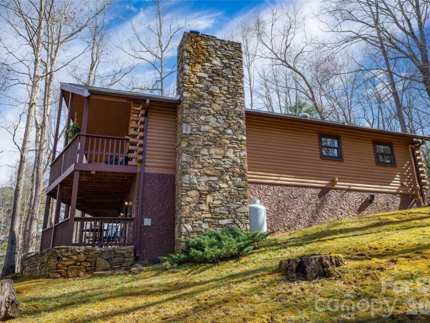 37 Cherokee Trail, Fletcher, NC 28732.  MLS# CAR4357676, YatesRealty ID 9928. Stacked stone chimney