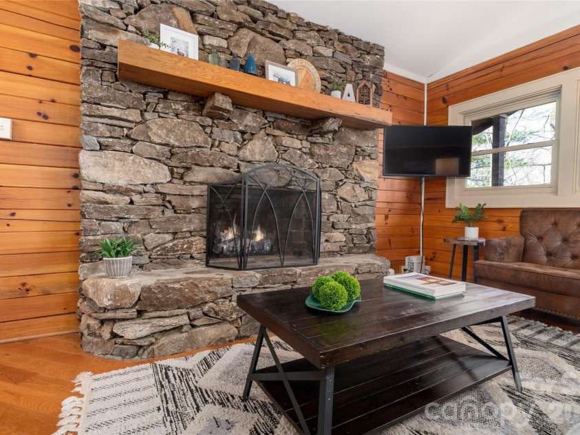 37 Cherokee Trail, Fletcher, NC 28732.  MLS# CAR4357676, YatesRealty ID 9928. Stacked stone gas fireplace