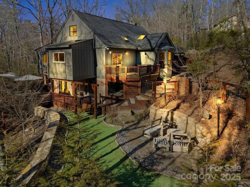 51 Gagama Court, Brevard, NC 28712.  MLS# CAR4225198, YatesRealty ID 9929. Welcome to 51 Gagama! Flagstone pathways, wooden decks, stone walls, gorgeous hardscape, and privacy .... the best that the mountains have to offer is right in your backyard!