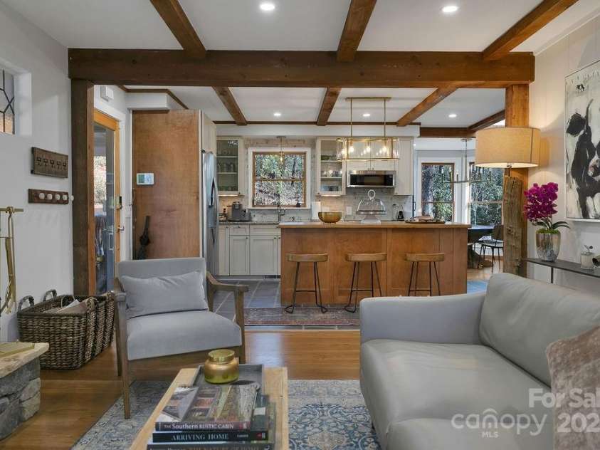 51 Gagama Court, Brevard, NC 28712.  MLS# CAR4225198, YatesRealty ID 9929. Wood beams and wide planked wood floors provide architectural interest and warmth