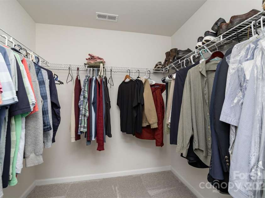 1004 Whipcord Drive, Waxhaw, NC 28173.  MLS# CAR4235846, YatesRealty ID 9930. 2 walk-in closets in primary bedroom
