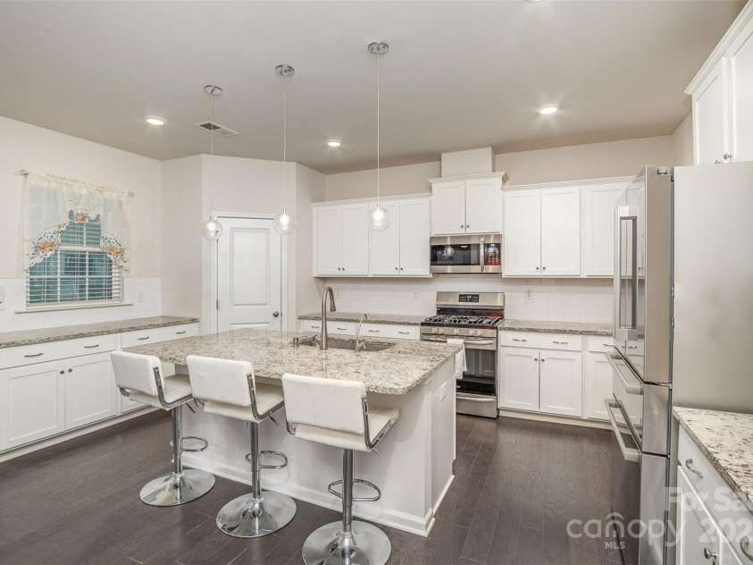 1004 Whipcord Drive, Waxhaw, NC 28173.  MLS# CAR4235846, YatesRealty ID 9930. Gourmet Kitchen with quartz countertops