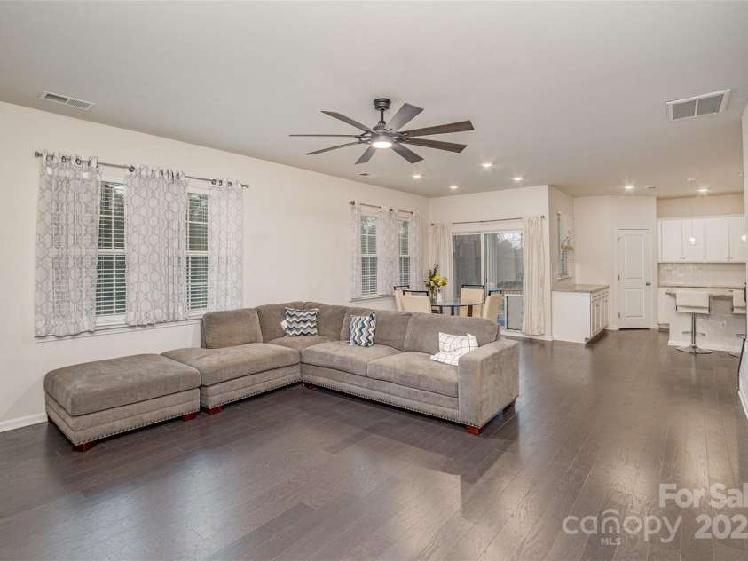 1004 Whipcord Drive, Waxhaw, NC 28173.  MLS# CAR4235846, YatesRealty ID 9930. Living Room & Kitchen great for entertaining