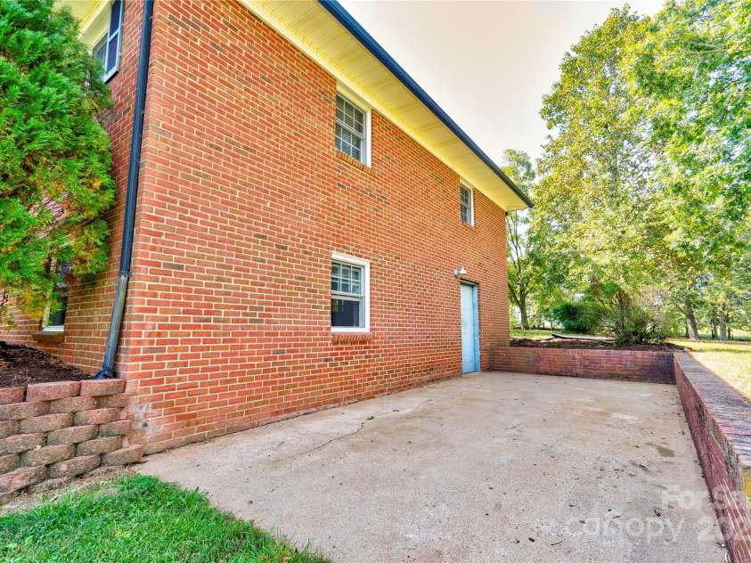 4029 Fallston Road, Shelby, NC 28150.  MLS# CAR4306182, YatesRealty ID 9936. Basement Entrance with Patio