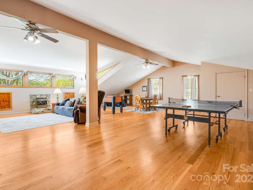 620 Mason Branch Road, Bryson City, NC 28713.  MLS# CAR4246489, YatesRealty ID 9936. Upstairs game room/rec room