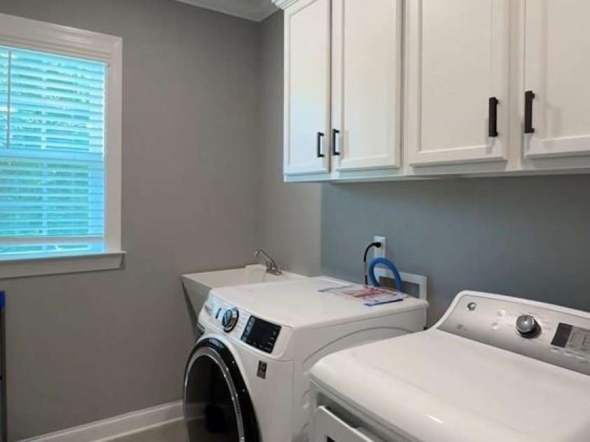 2044 Sweet William Drive, Harrisburg, NC 28075.  MLS# CAR4149349, YatesRealty ID 9940. Laundry room