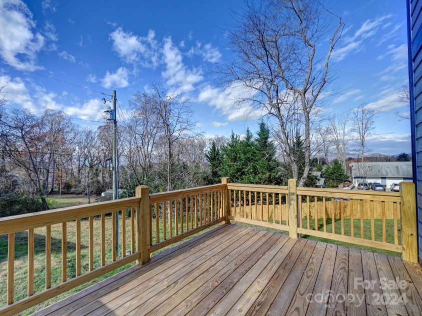 52 Fox Drive, Asheville, NC 28803.  MLS# CAR4201409, YatesRealty ID 9941. Add your umbrella table and chairs and grill here