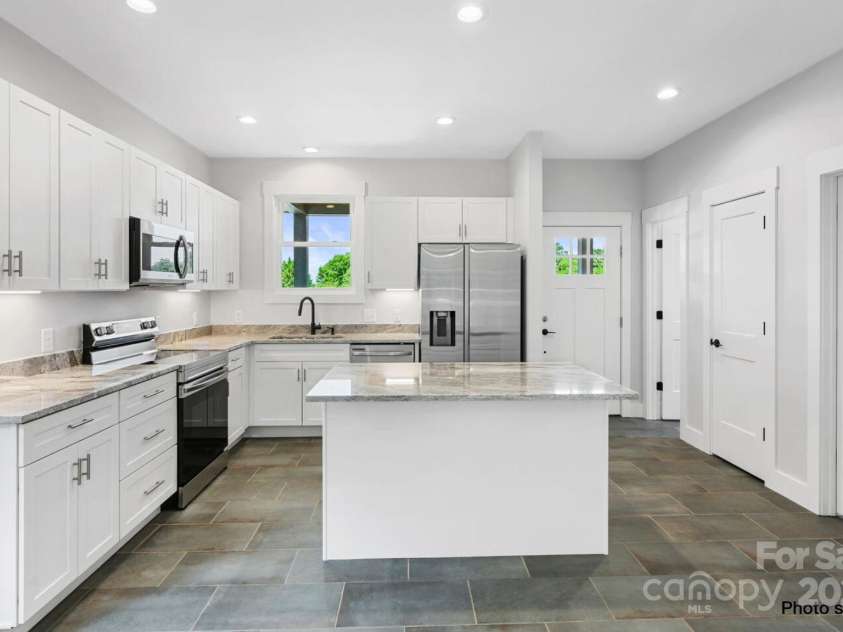 33 Loblolly Lane, Asheville, NC 28803.  MLS# CAR4228799, YatesRealty ID 9944. 