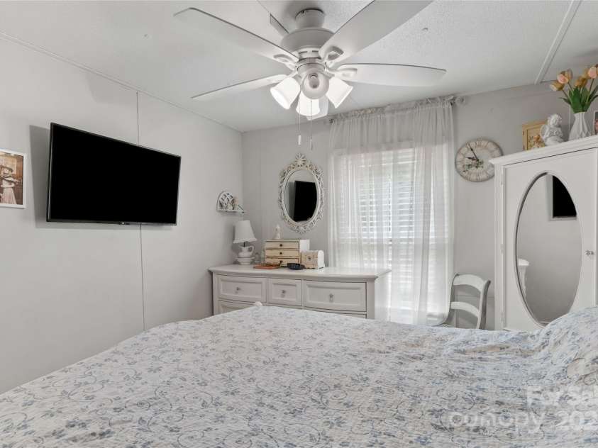 491 Lance Avenue, Hot Springs, NC 28743.  MLS# CAR4235506, YatesRealty ID 9947. Primary bedroom window looks towards the front yard