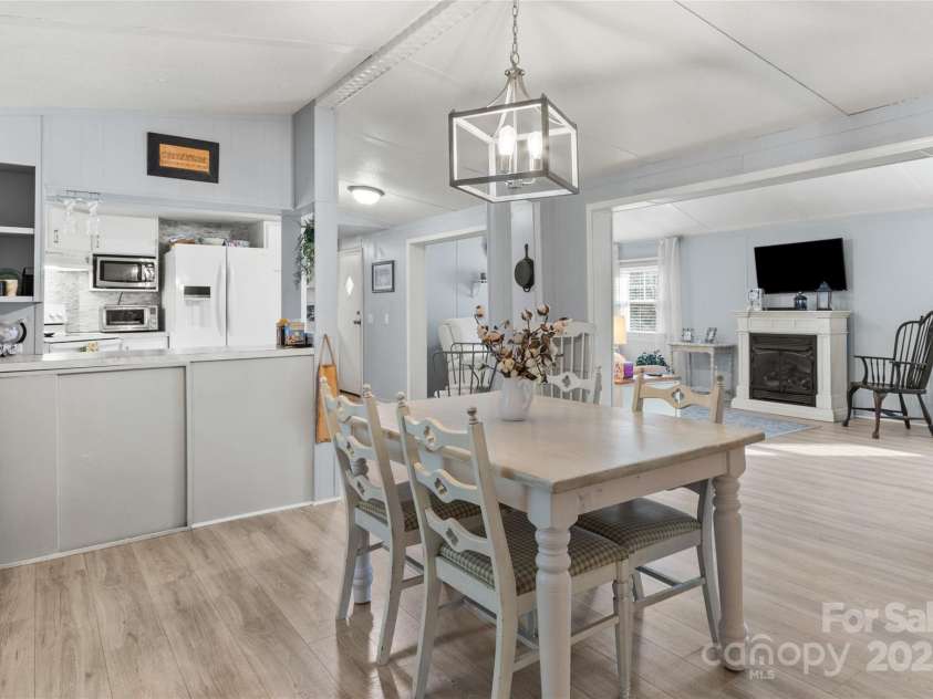 491 Lance Avenue, Hot Springs, NC 28743.  MLS# CAR4235506, YatesRealty ID 9947. Welcoming entryway into the dining area with a view of the open floorplan.