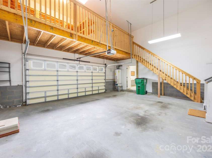 16919 Hedgerow Park Road, Charlotte, NC 28277.  MLS# CAR4249094, YatesRealty ID 9957. OVERSIZED GARAGE with Storage Area