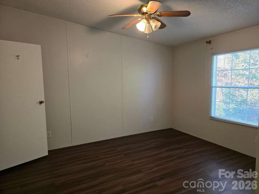 129 Oak Trails Pass, Leicester, NC 28748.  MLS# CAR4329467, YatesRealty ID 9958. Primary bedroom