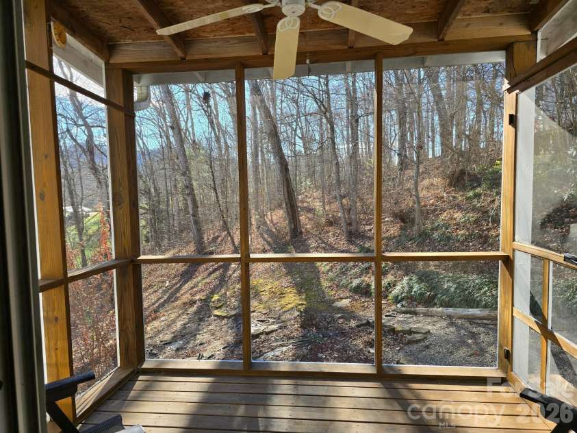 129 Oak Trails Pass, Leicester, NC 28748.  MLS# CAR4329467, YatesRealty ID 9958. Screened porch