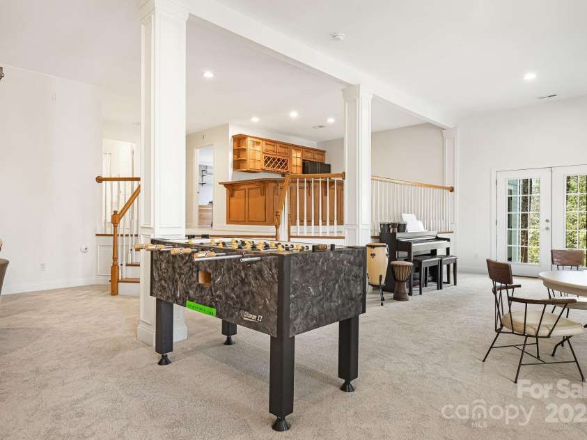 36 White Ash Drive, Asheville, NC 28803.  MLS# CAR4239154, YatesRealty ID 9961. Basement Game Room