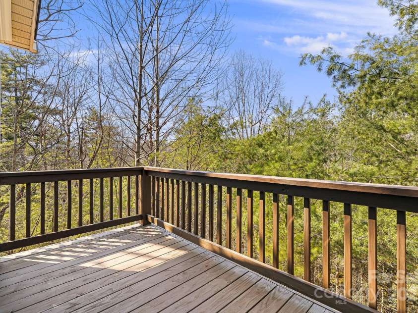 36 White Ash Drive, Asheville, NC 28803.  MLS# CAR4239154, YatesRealty ID 9961. Deck off of Sunroom