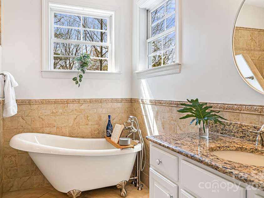 36 White Ash Drive, Asheville, NC 28803.  MLS# CAR4239154, YatesRealty ID 9961. Primary Bathroom (Main Level)