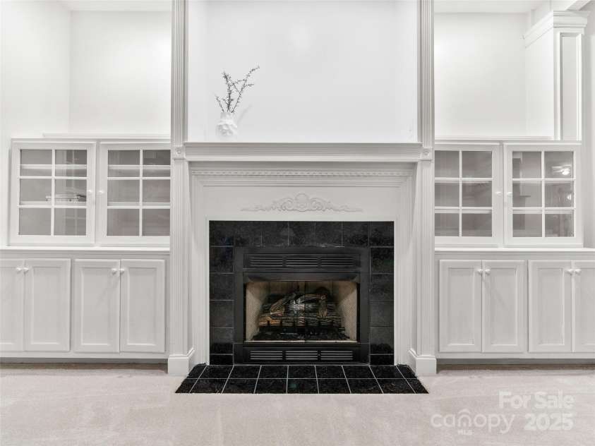 36 White Ash Drive, Asheville, NC 28803.  MLS# CAR4310417, YatesRealty ID 9961. Fireplace in basement 