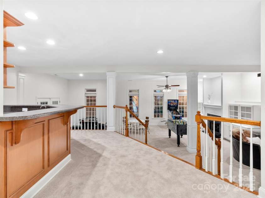 36 White Ash Drive, Asheville, NC 28803.  MLS# CAR4310417, YatesRealty ID 9961. Recreation area in basement 