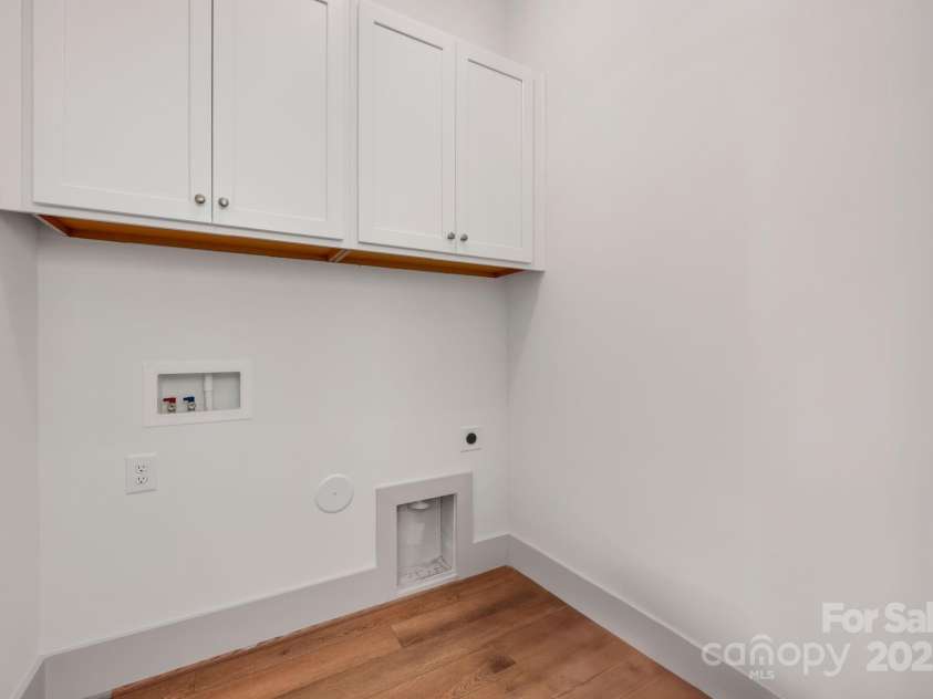 718 Barrel Alley, Fort Mill, SC 29715.  MLS# CAR4217978, YatesRealty ID 9964. Laundry Room with Additional Cabinetry